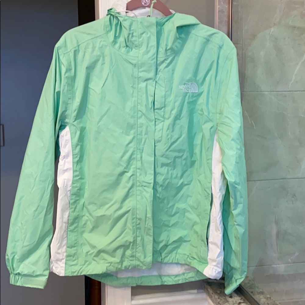 Green north face rain jacket